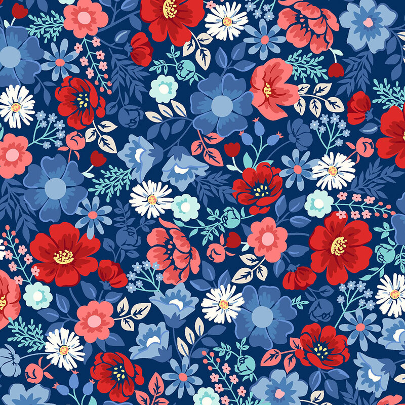 A colorful floral pattern featuring red, pink, and blue flowers on a dark blue background.