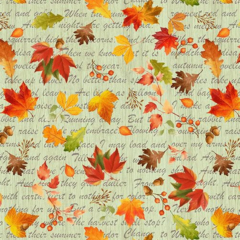 Sage green fabric with a text overlay and vibrant tossed autumn foliage.