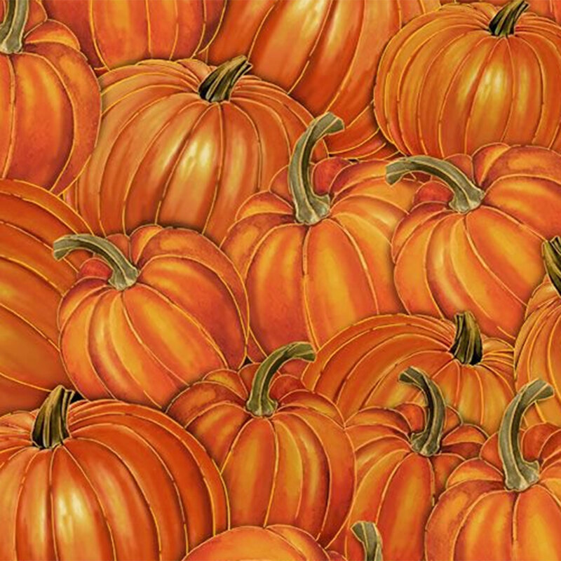 Orange fabric packed with large fall pumpkins with metallic accents.