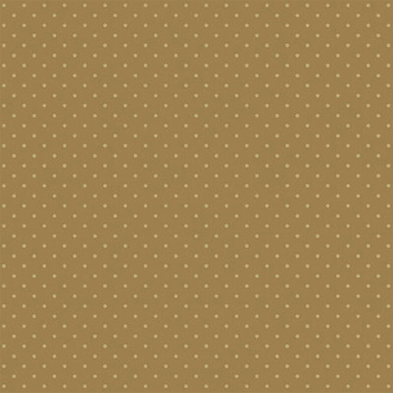 Golden brown fabric with a repeating pattern of small cream dots.