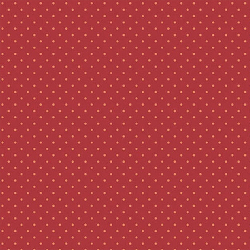 Red fabric with evenly spaced small orange polka dots.