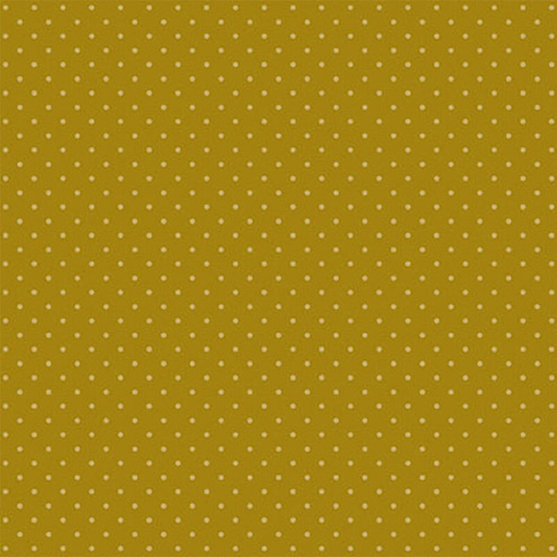 Patterned fabric featuring a mustard yellow background with small white polka dots.