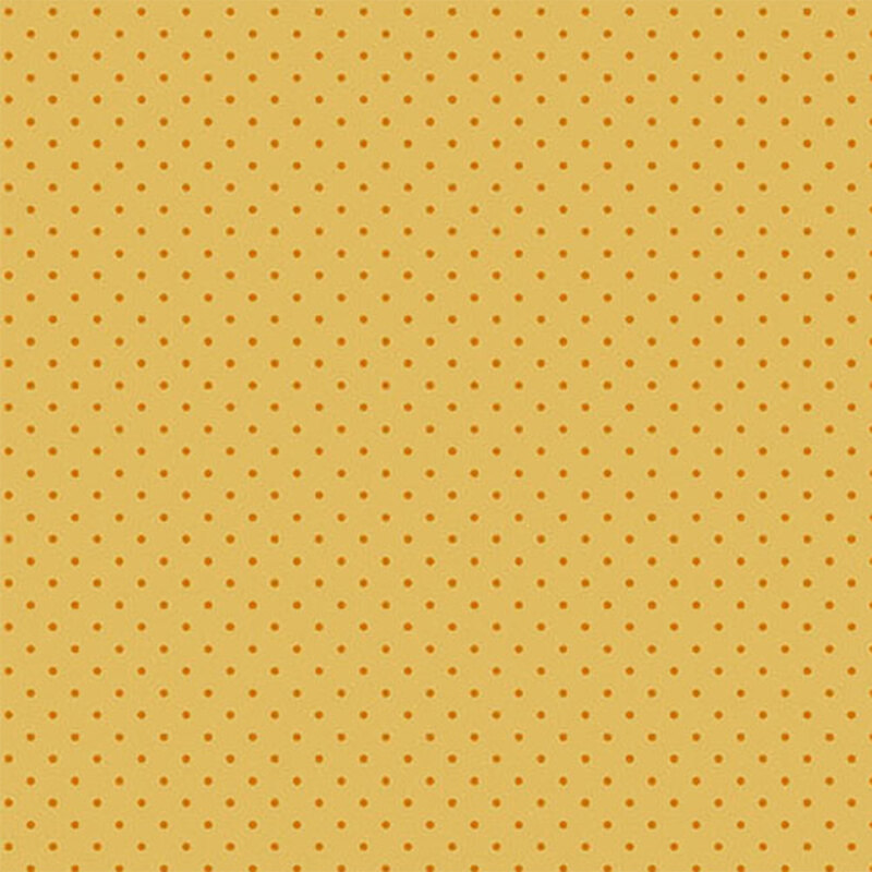 A yellow fabric with a pattern of small orange polka dots.