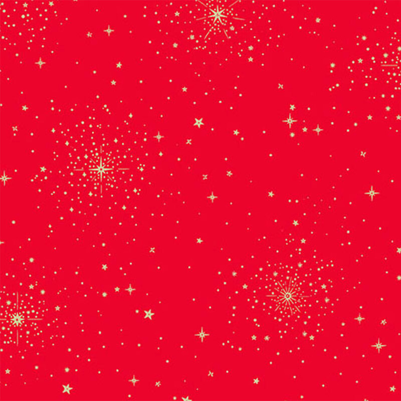 Red fabric scattered with golden stars of various sizes, creating a festive celestial pattern.