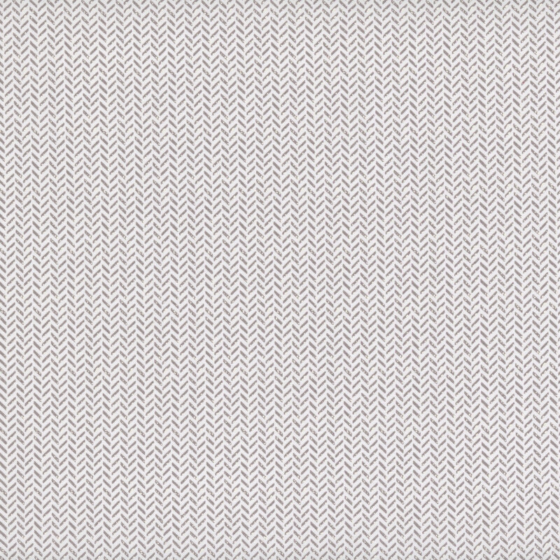 White fabric with alternating herringbone pattern in gray.