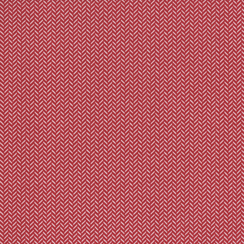 Red fabric with alternating herringbone pattern in white.