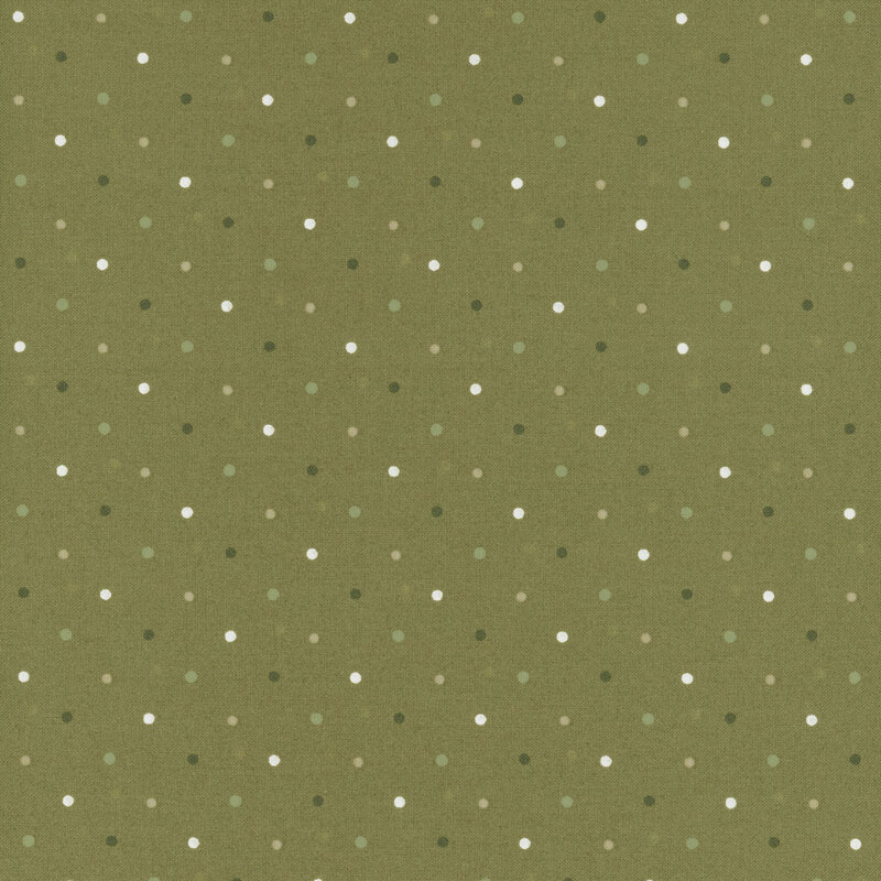 Sage green fabric with a dark green, white, and gray polka dot pattern.