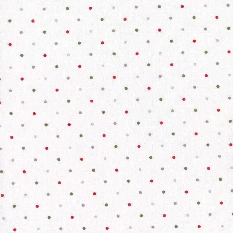 White fabric with a green, red, and gray polka dot pattern.