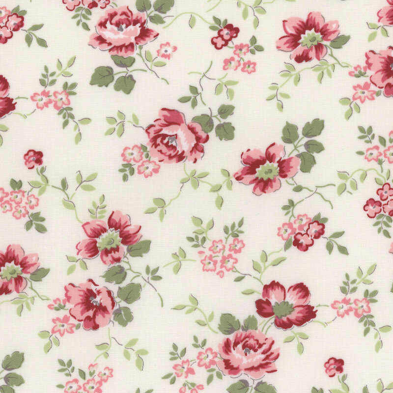 Floral fabric pattern featuring pink and red roses with green leaves on a cream background.