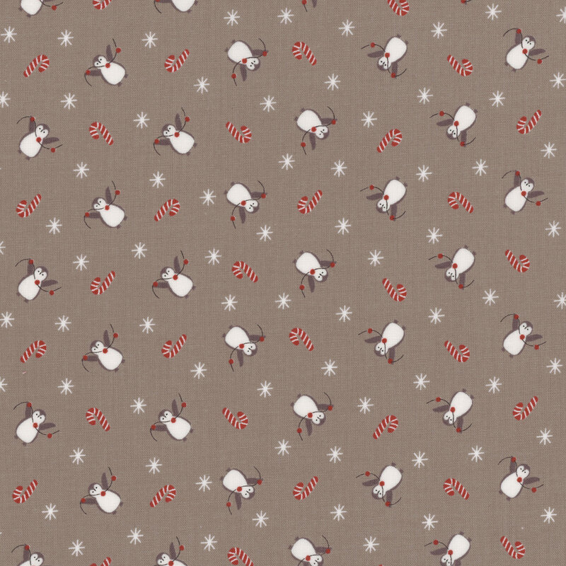 Patterned fabric featuring playful penguins, red candy canes, and white snowflakes on a taupe background.