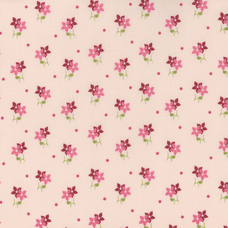 Light pink fabric with scattered clusters of small pink flowers and green leaves.