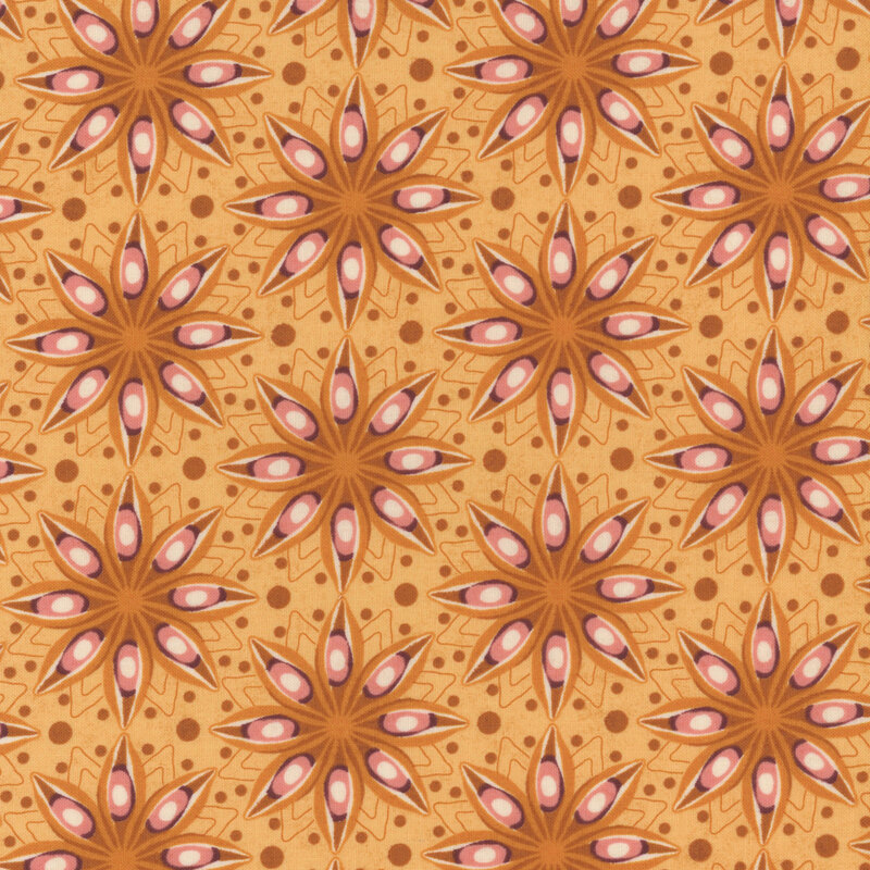 Yellow fabric with star-shaped flowers in shades of pink and orange on a dotted background.