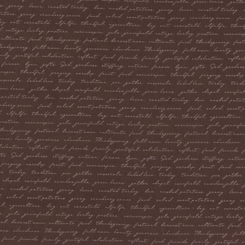 Brown fabric with delicate handwritten cursive writing with autumn and Thanksgiving-themed phrases.