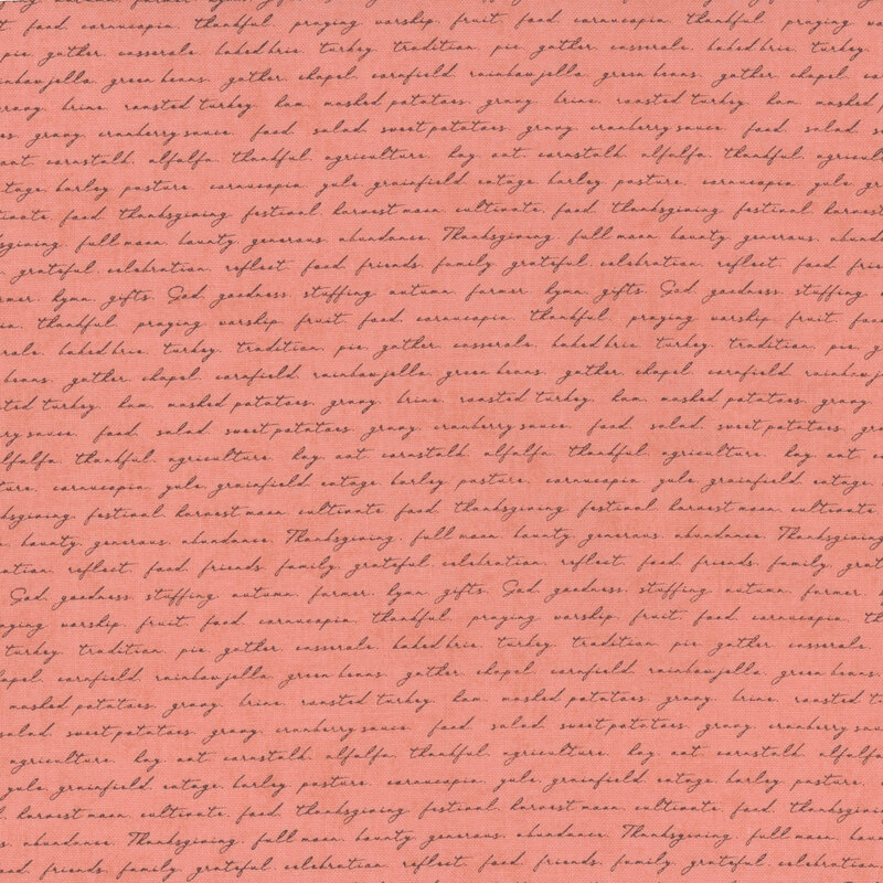 Pink fabric with delicate handwritten cursive writing with autumn and Thanksgiving-themed phrases.