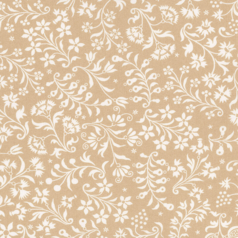 Light tan fabric with white twisting, ornamental leaf and flower designs.