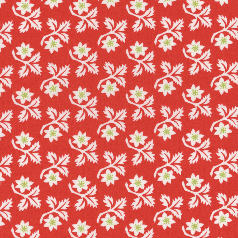 Red fabric with rows of white angular leaves and flowers with light green centers.