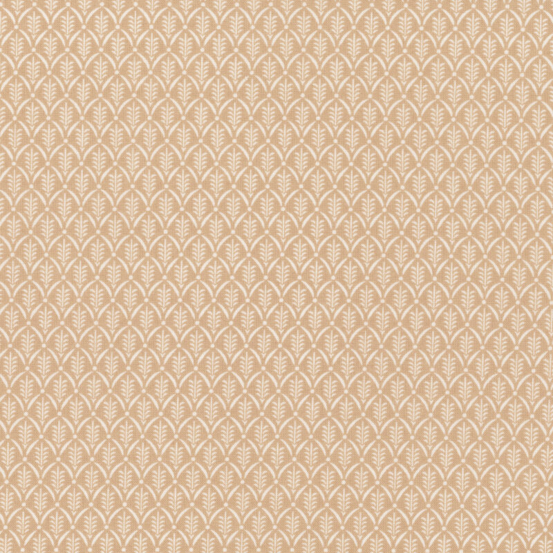 Light tan fabric with a white pattern of scallops framing little sprigs.