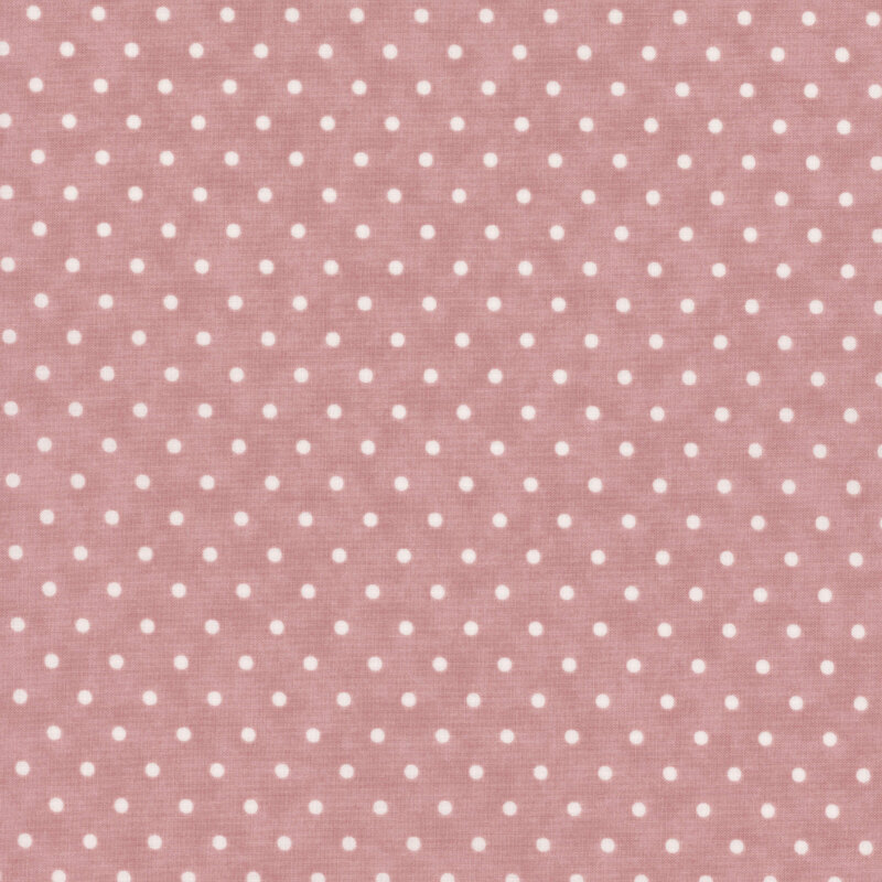 Light pink polka dotted fabric 