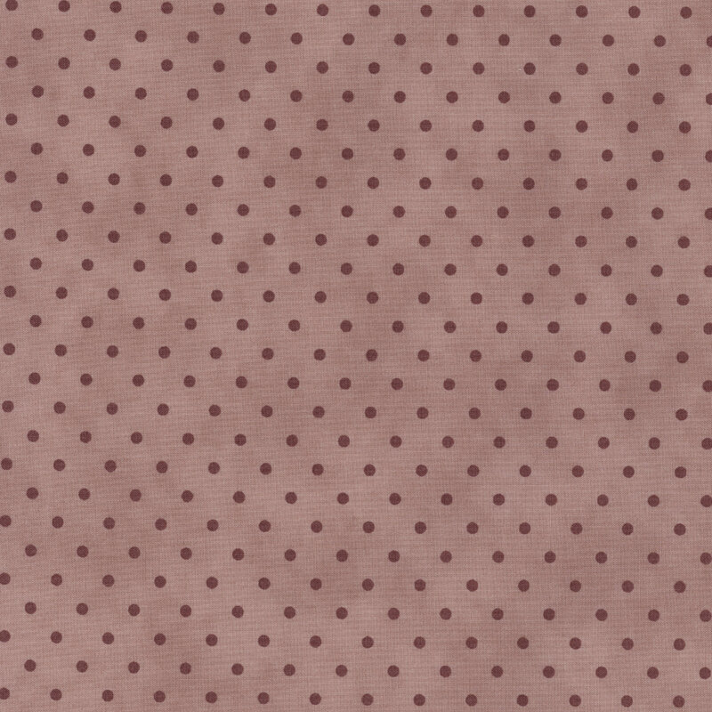 Muted pink polka dotted fabric 