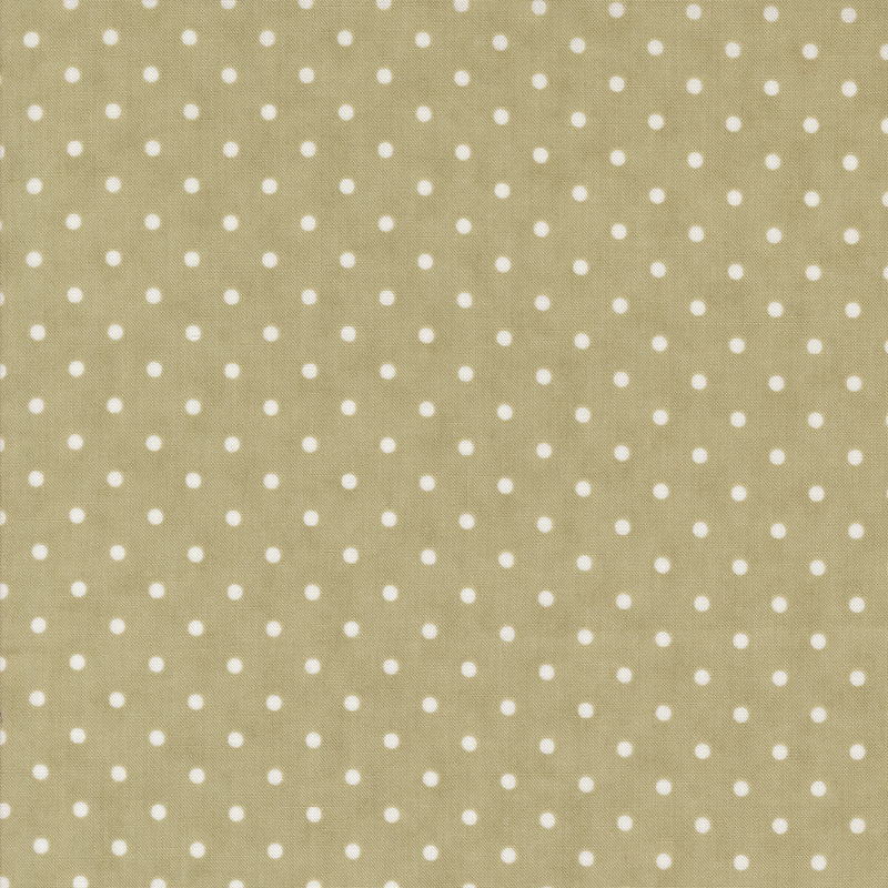 Light green fabric with a repeating pattern of small white polka dots.