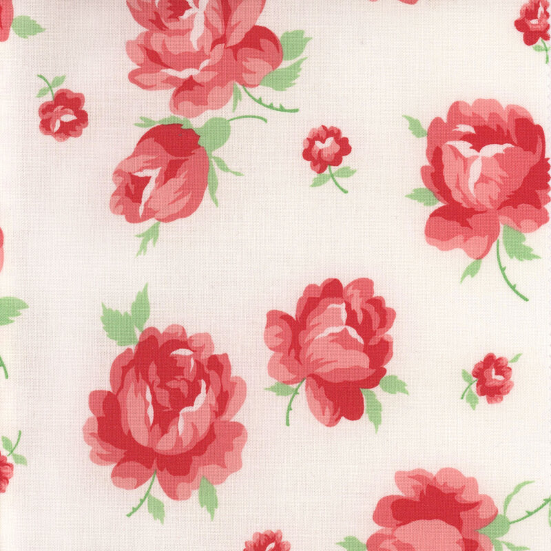 Fabric featuring large red roses with smaller buds on a cream background.