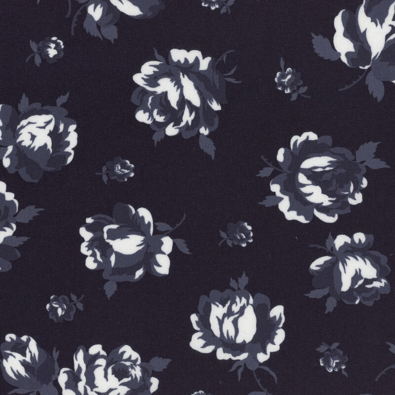 Fabric featuring large navy blue and white roses with smaller buds on a navy blue background.