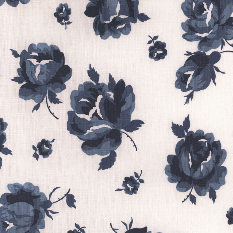 Fabric featuring large navy blue roses with smaller buds on a white background.