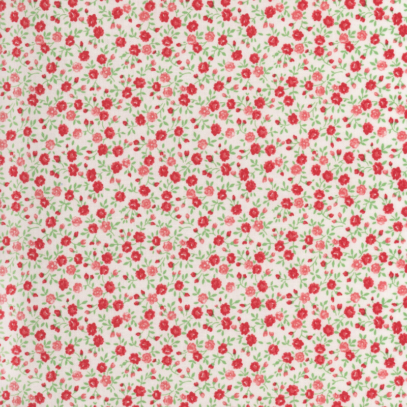 A repeating pattern of small red and pink roses on a white background, with green leaves.