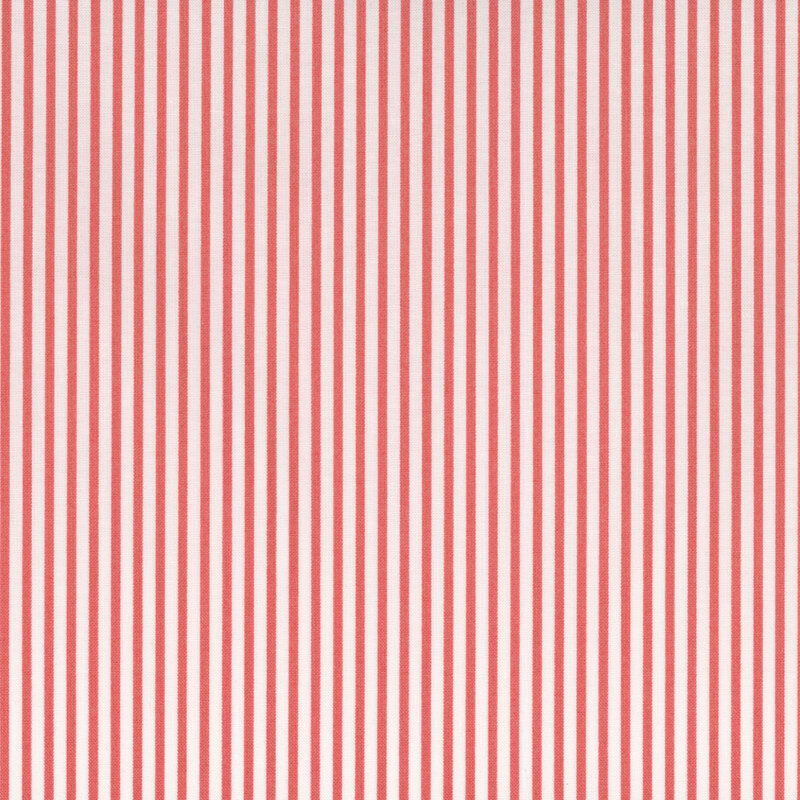 white and pink thinly striped fabric