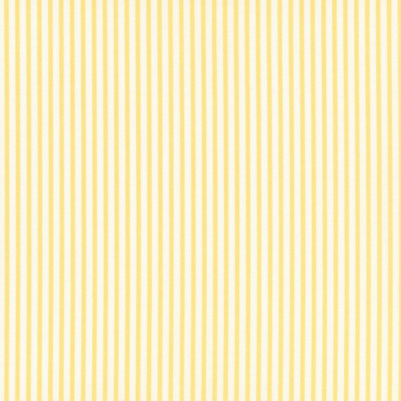 white and yellow thinly striped fabric