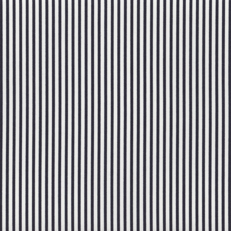 White and navy blue thinly striped fabric