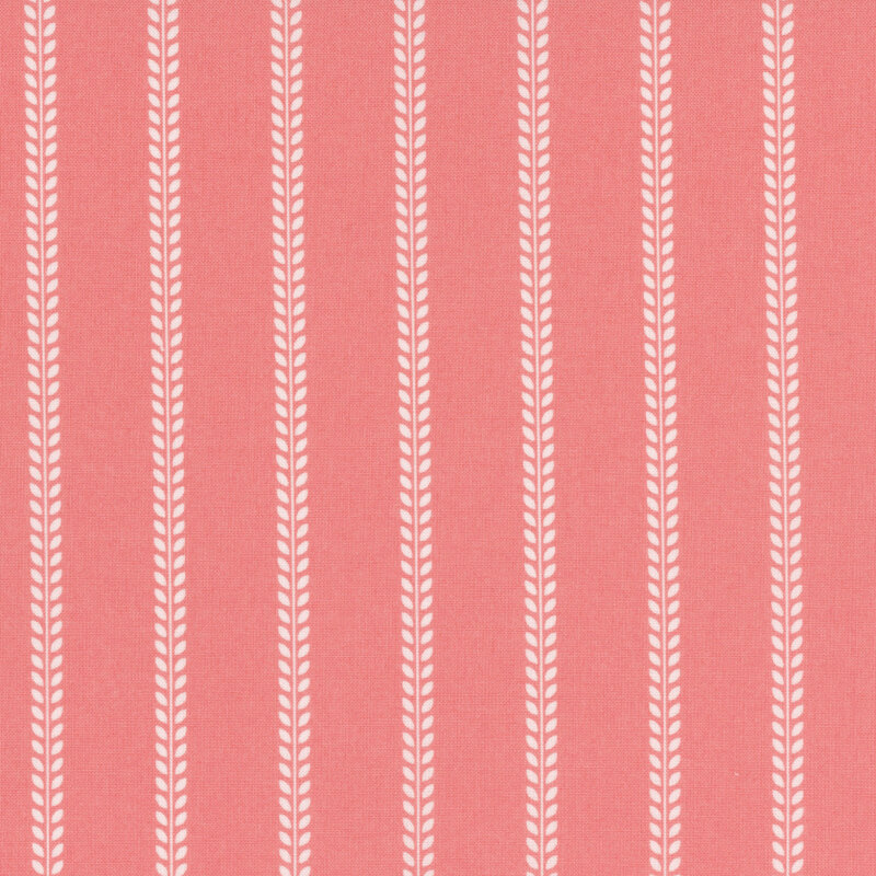 Repeating pattern of vertical white leaf motifs on a piink background.