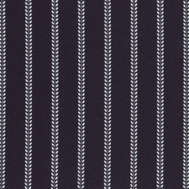 Repeating pattern of vertical white leaf motifs on a navy background.