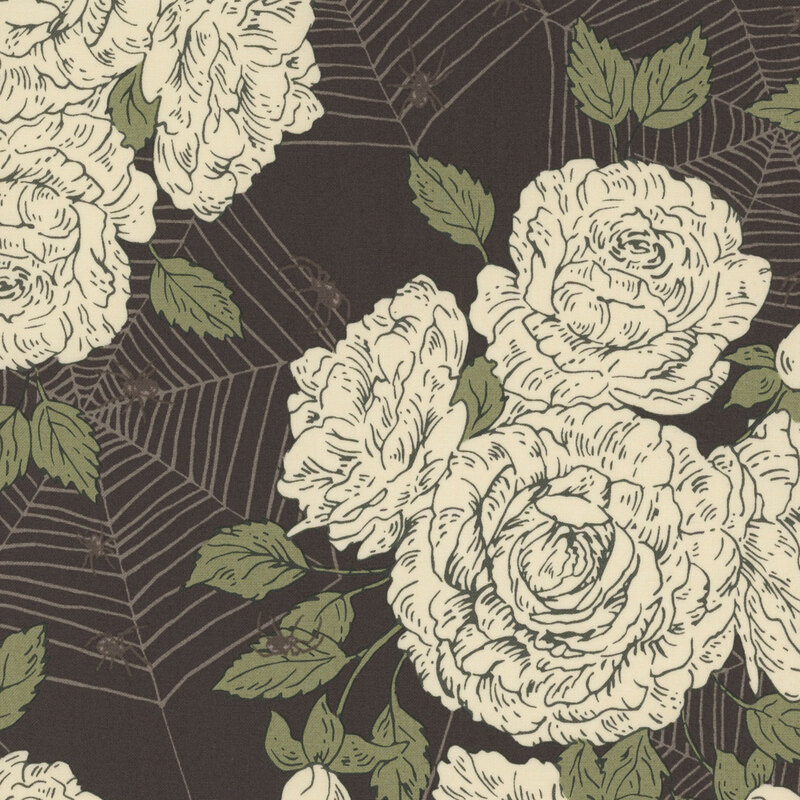 Dark gray fabric with white flowers and intricate tonal spiderwebs stretched across the design.