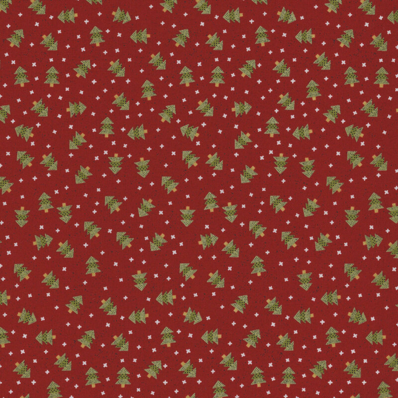 Red fabric with scattered green Christmas trees and small white snowflakes.