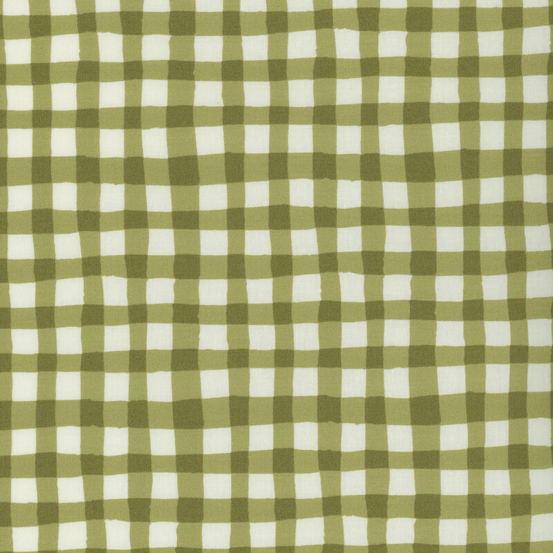 Green and white checkered fabric with evenly spaced squares.