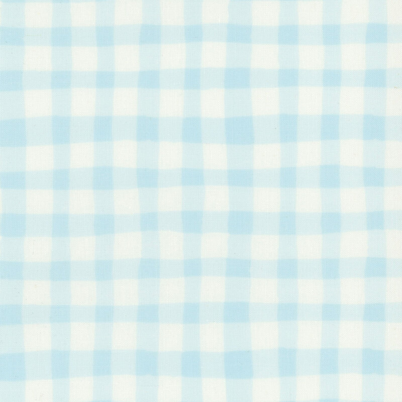 Light blue and white checkered fabric with alternating squares.