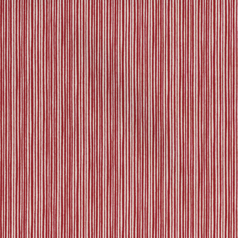 Red and white vertical stripes create a simple, textured fabric pattern.