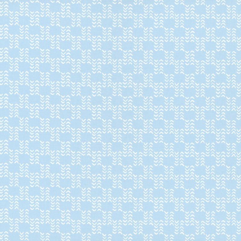 Light blue fabric with a repeating white wavy pattern.