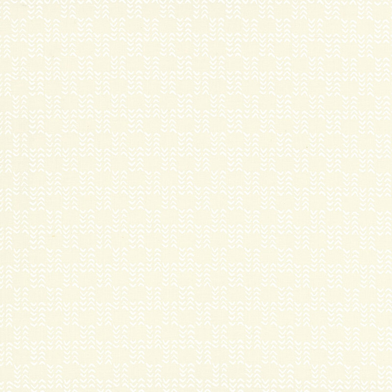 Light cream fabric with a repeating wavy white pattern.