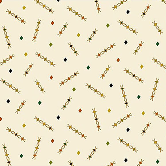 Patterned fabric with a cream background featuring scattered geometric shapes in warm colors.