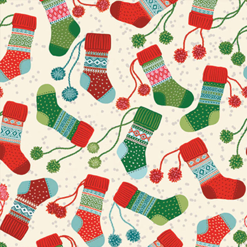 Colorful Christmas stockings in various patterns scattered on a light background.