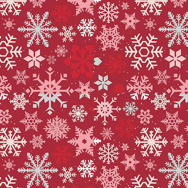 Red background adorned with various white and light pink snowflakes of different sizes and designs.