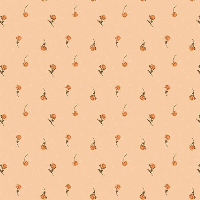 Fabric with a repeating floral pattern with small orange flowers on a soft peach background.