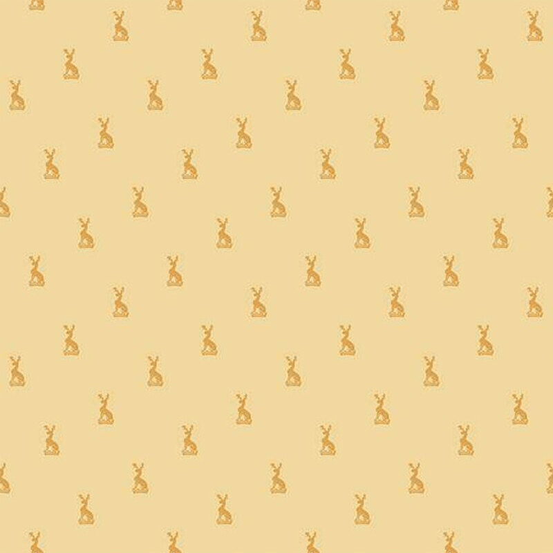 Seamless pattern of small gold deer accents on a buttery yellow background.