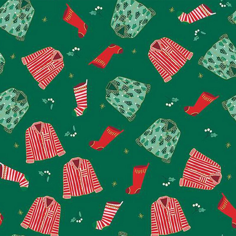 Dark green fabric featuring tossed Christmas pajamas, stockings, and holly sprigs