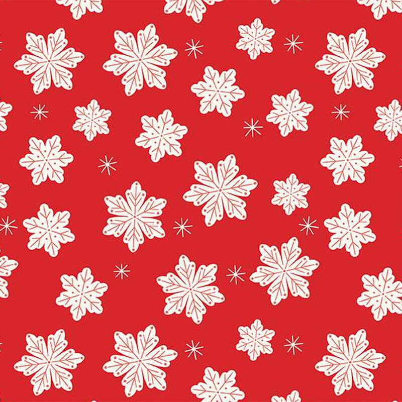 Red fabric with large white snowflake and small twinkling stars