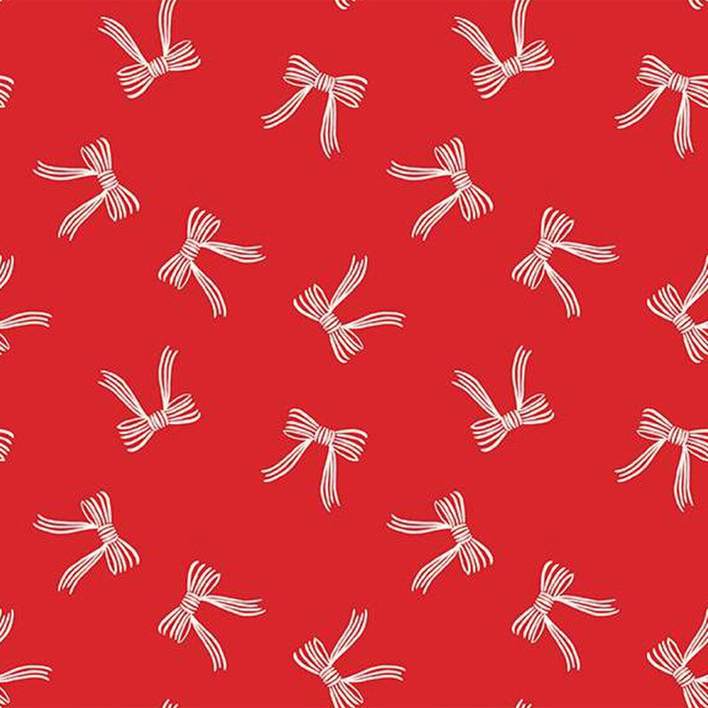 Red fabric featuring tossed white Christmas ribbon bows