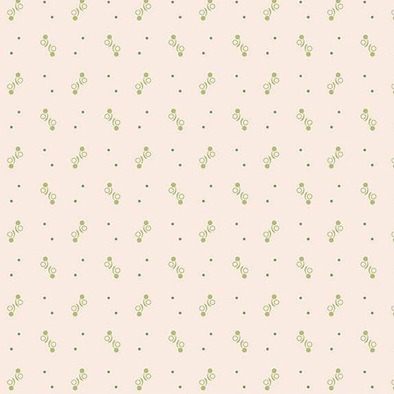 Light beige fabric with a repeating pattern of green leaves and small dots.