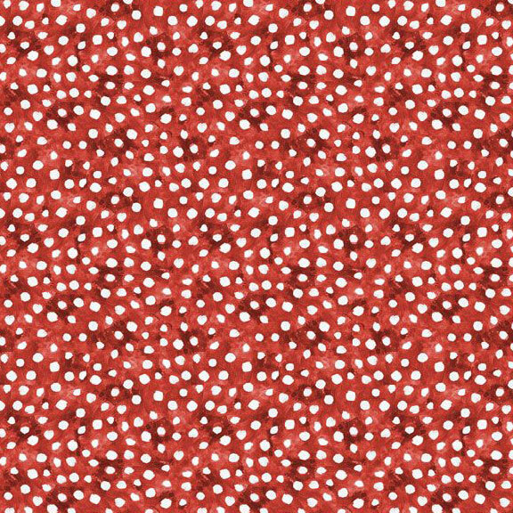 A mottled red fabric with scattered white dots.